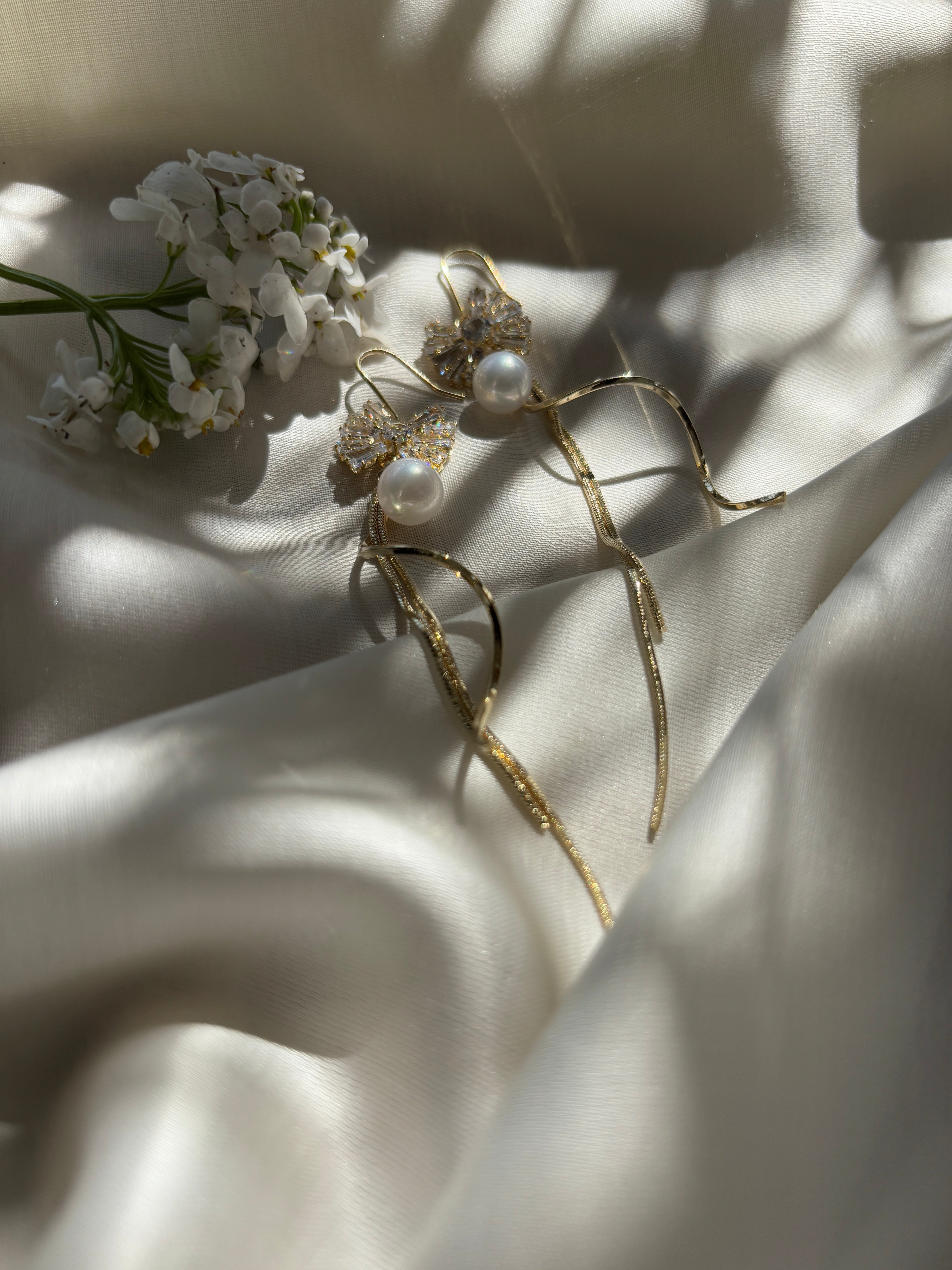 Crystal Bow Dangler Earrings