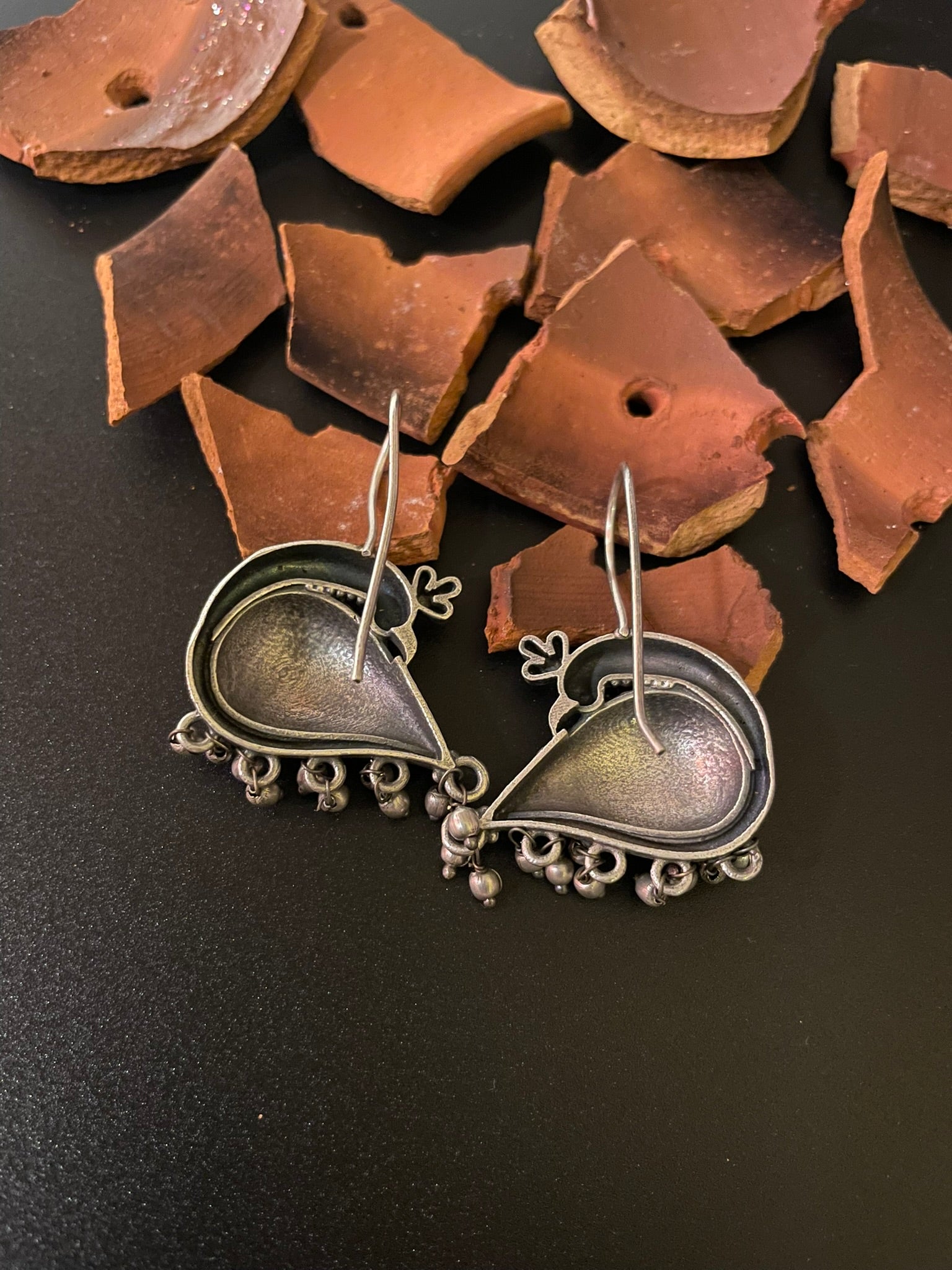 Oxidized Sitting Peacock Drop Earrings